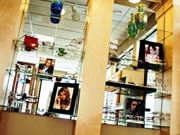 Shelving with pictures and eye wear