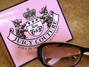 Juicy Couture logo and sunglasses